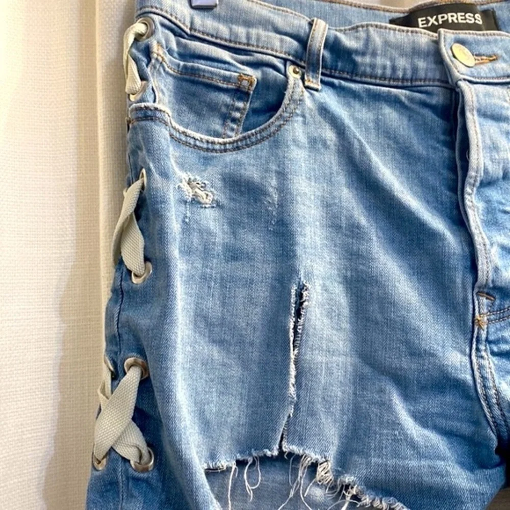 Women’s Express Shortie Vintage High Rise Button-fly Distressed Blue Jean Shorts